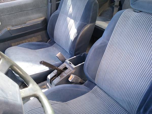 1991 blue/gray Nissan Pathfinder SUV