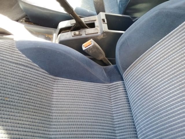 1991 blue/gray Nissan Pathfinder SUV