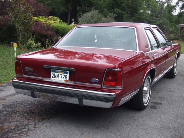 1991 Burgundy Ford Crown Victoria