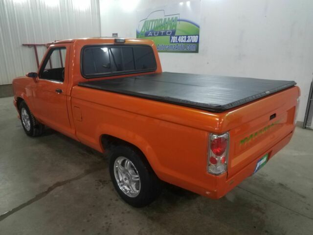 1991 Orange Ford Ranger Pickup Truck