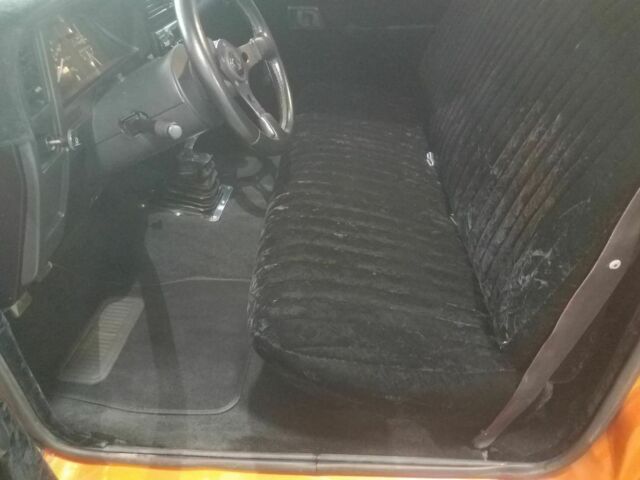 1991 Orange Ford Ranger Pickup Truck