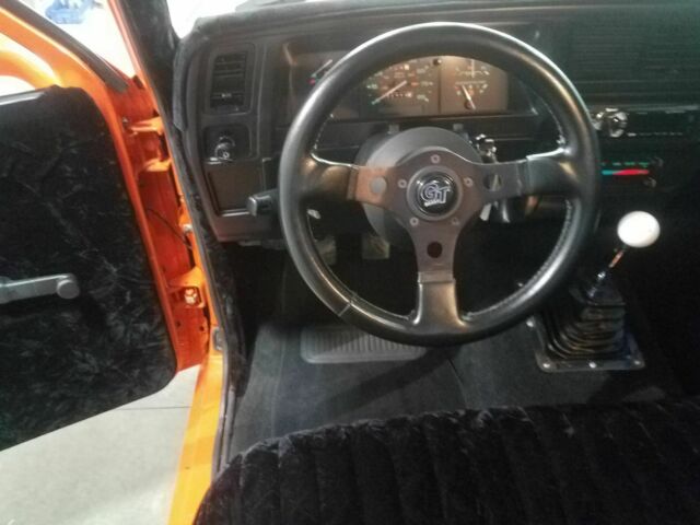 1991 Orange Ford Ranger Pickup Truck