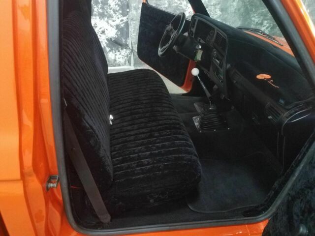 1991 Orange Ford Ranger Pickup Truck
