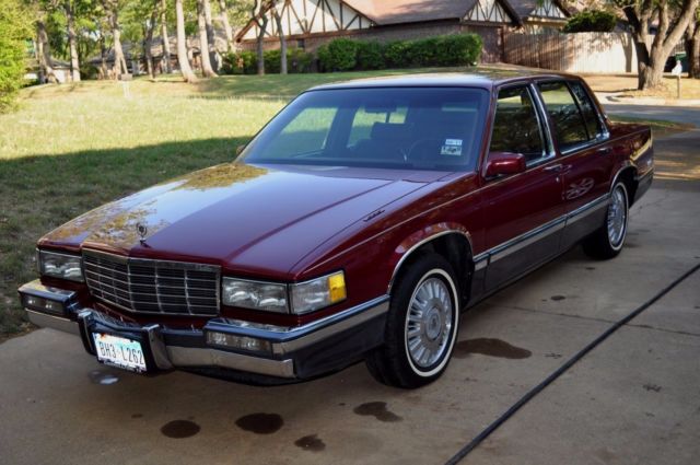 1991 Red Cadillac DeVille Sedan