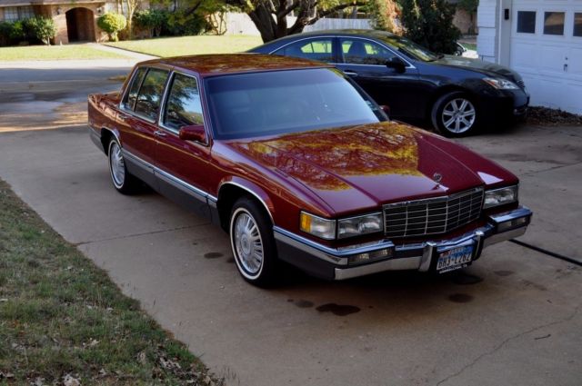 1991 Red Cadillac DeVille Sedan