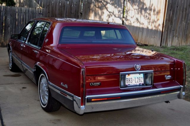 1991 Red Cadillac DeVille Sedan