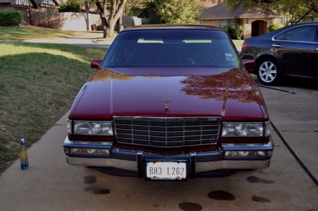 1991 Red Cadillac DeVille Sedan