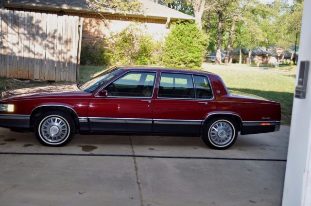 1991 Red Cadillac DeVille Sedan