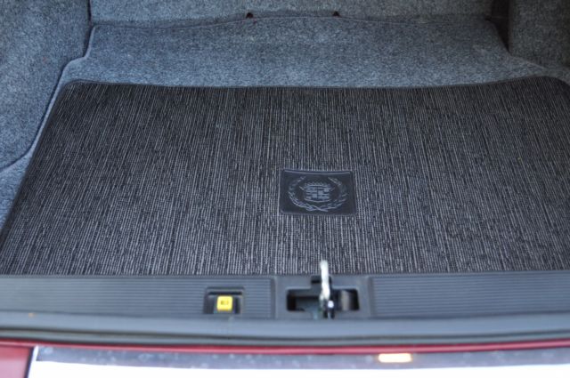 1991 Red Cadillac DeVille Sedan