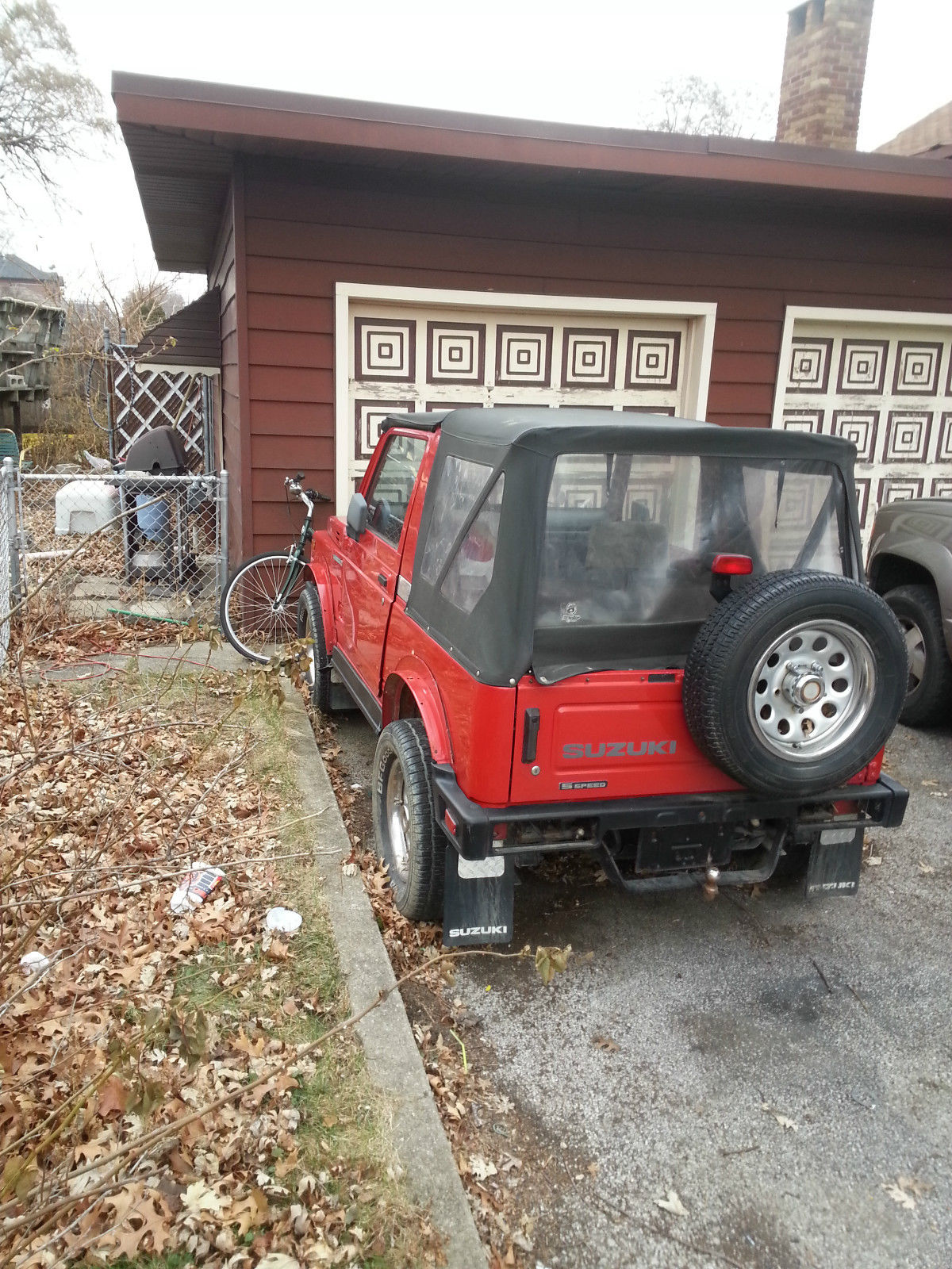 1991 Red Suzuki Samurai SUV