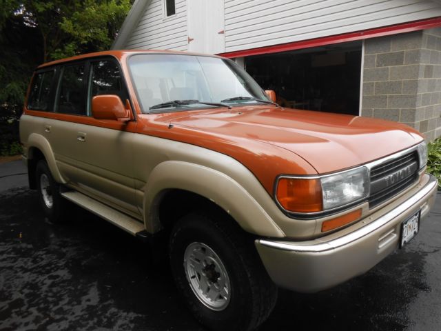 1991 burnt orange/almond Toyota Land Cruiser SUV