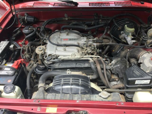 1991 Red Toyota Pickup Extended Cab Pickup