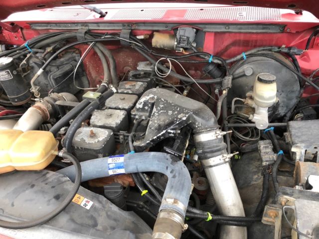 1992 Red Ford F-250 Extended Cab Pickup