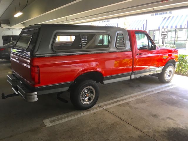 1992 Red Ford F-150 Standard Cab Pickup