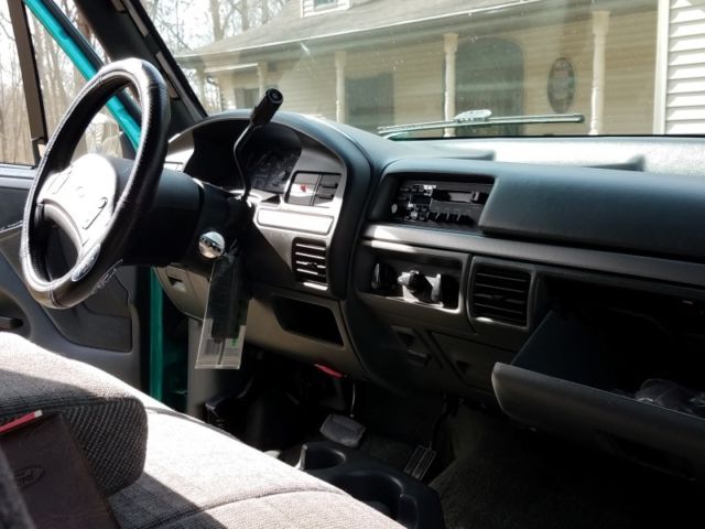 1992 green Ford F-150 truck