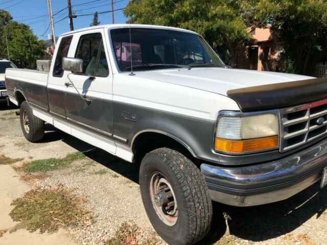 1992 White and olive Ford F-250 Extended Cab Pickup