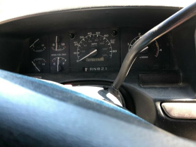 1992 White and olive Ford F-250 Extended Cab Pickup