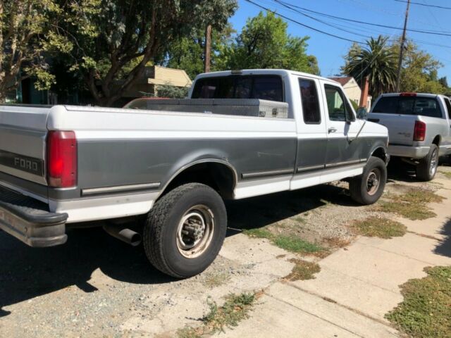 1992 White and olive Ford F-250 Extended Cab Pickup