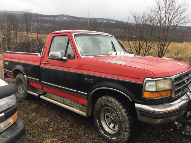 1992 Red Ford F-150 Standard Cab Pickup