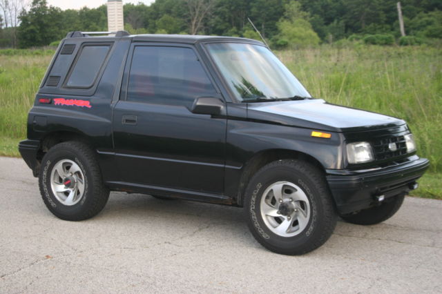 1992 Black Chevrolet Tracker 2 dr. hardtop