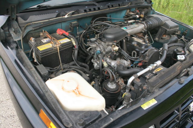 1992 Black Chevrolet Tracker 2 dr. hardtop