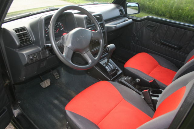 1992 Black Chevrolet Tracker 2 dr. hardtop