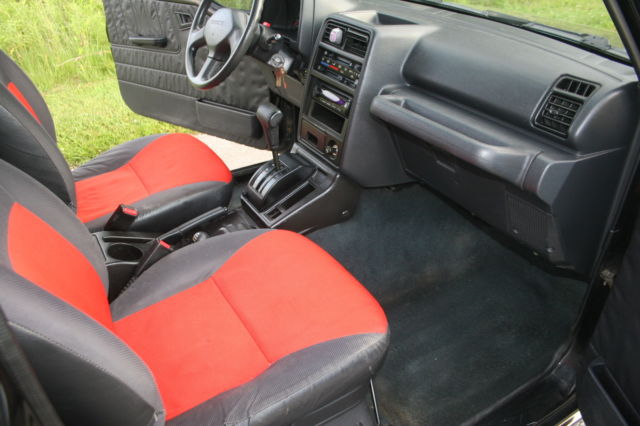 1992 Black Chevrolet Tracker 2 dr. hardtop