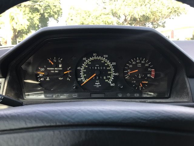 1992 Gold Mercedes-Benz 300-Series Coupe