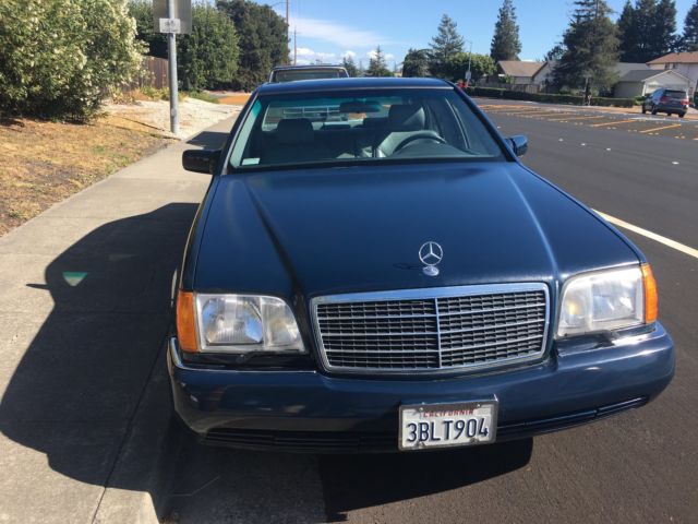 1992 Blue Mercedes-Benz 400-Series Sedan
