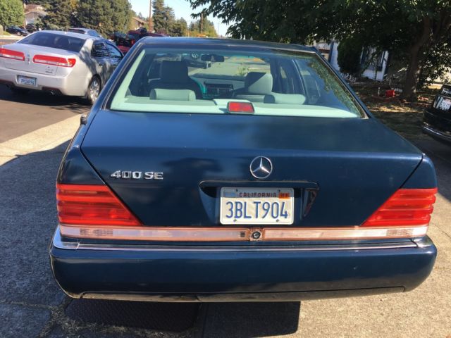 1992 Blue Mercedes-Benz 400-Series Sedan