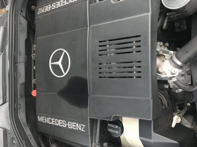 1992 Blue Mercedes-Benz 400-Series Sedan