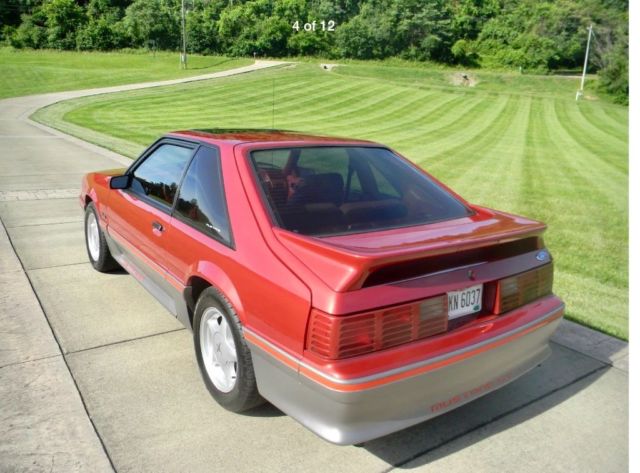 1992 Burgundy Ford Mustang SUV