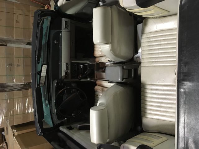 1992 Teal Ford Mustang Convertible