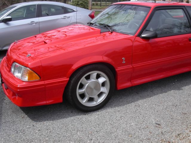 1992 performance red Ford Mustang Hatchback