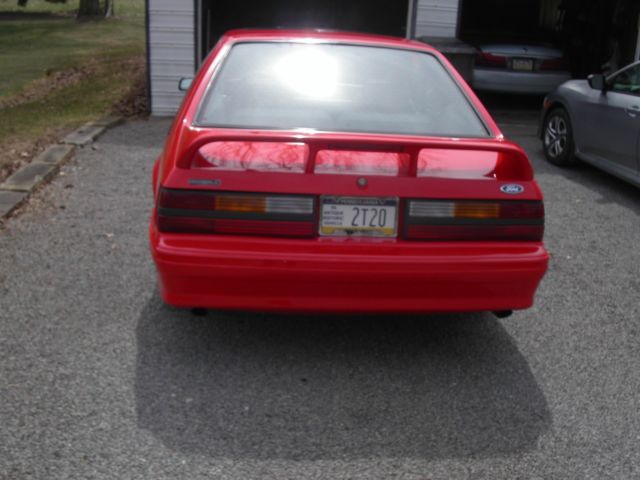 1992 performance red Ford Mustang Hatchback