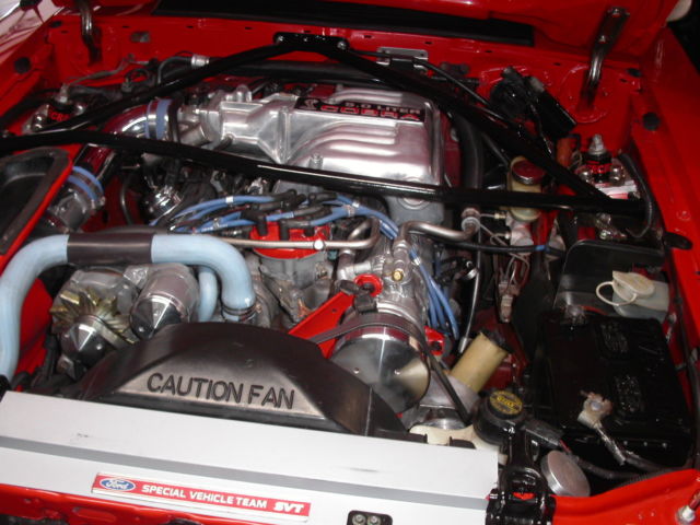 1992 performance red Ford Mustang Hatchback