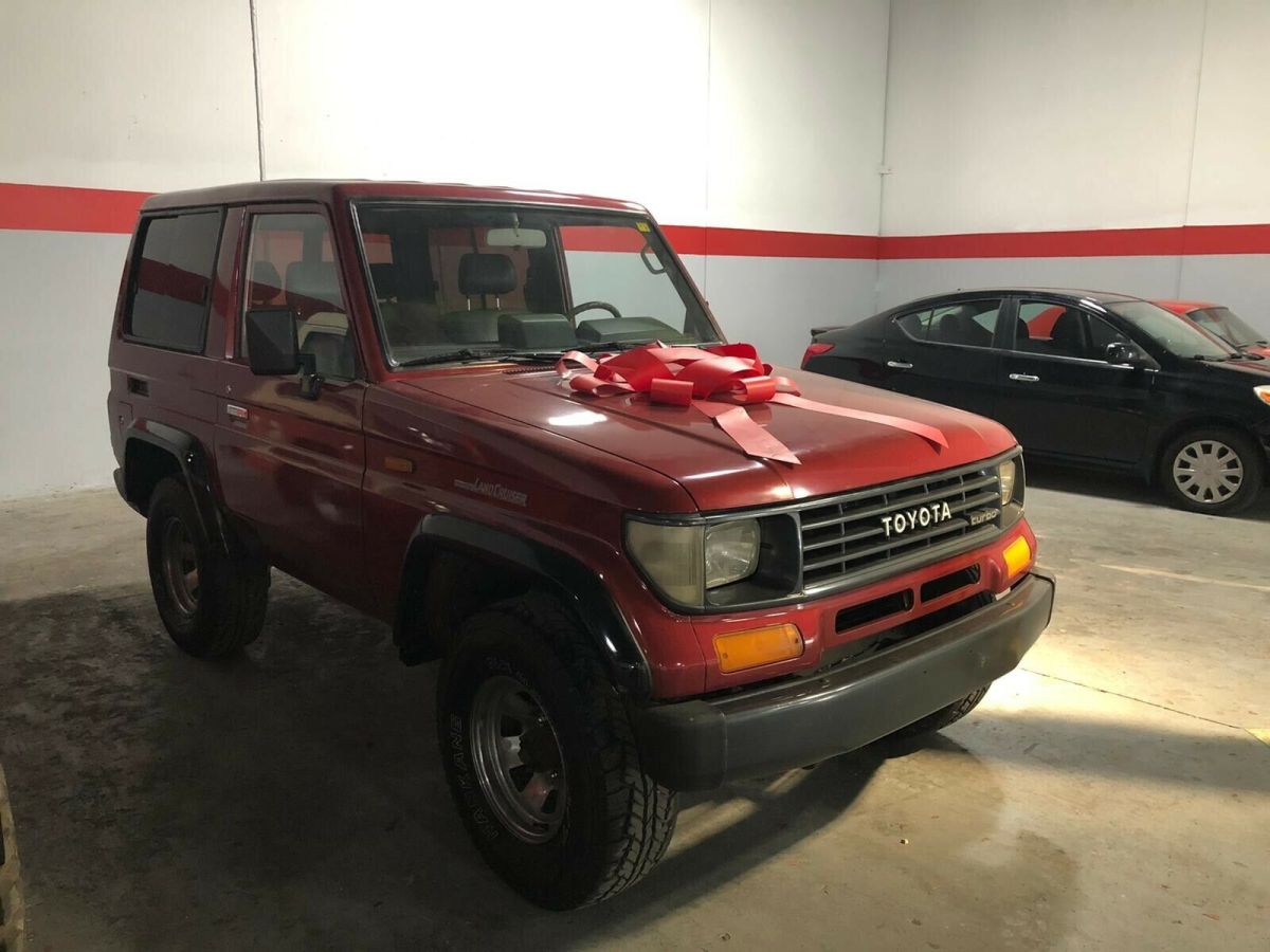 1992 Burgundy Toyota Land Cruiser SUV