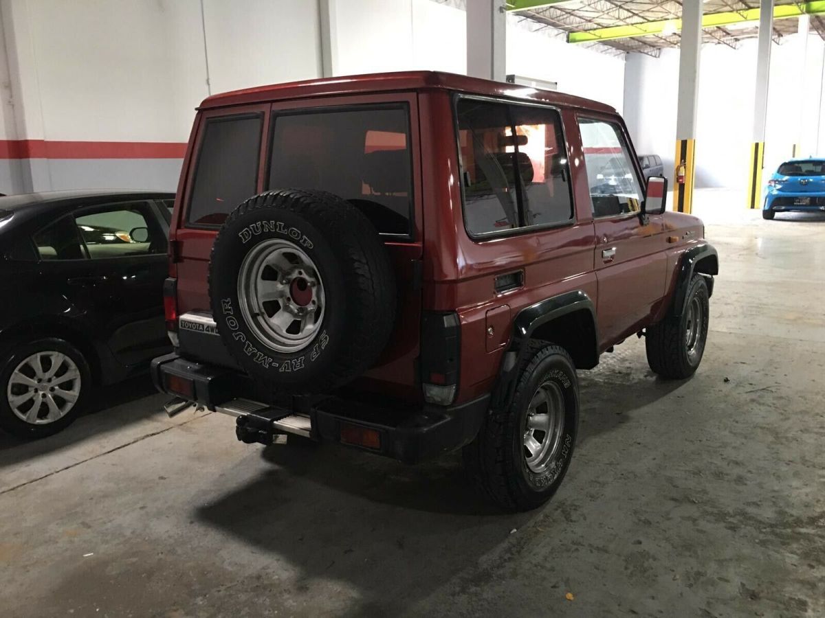 1992 Burgundy Toyota Land Cruiser SUV