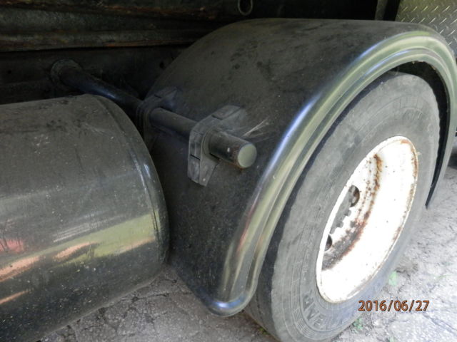 1992 White Nissan Other Dump body