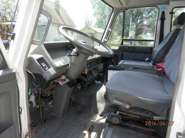 1992 White Nissan Other Dump body