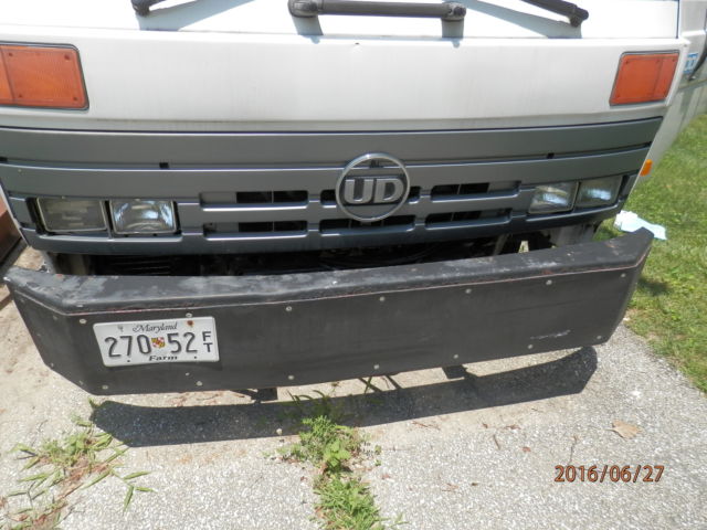 1992 White Nissan Other Dump body