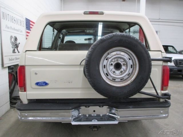 1992 Tan Ford Bronco SUV