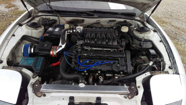 1993 white Mitsubishi 3000GT Hatchback