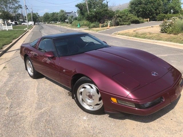 1993 40th naive. maroon Chevrolet Corvette Coupe