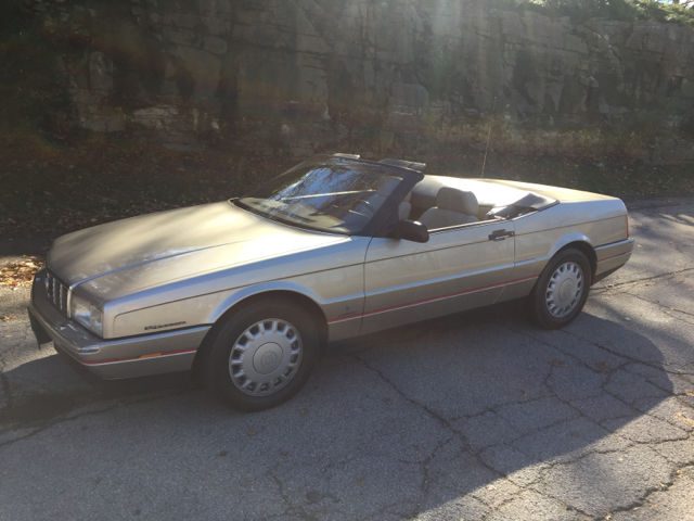 1993 metallic gold Cadillac Allante Convertible