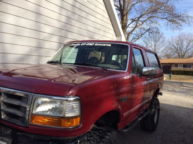 1993 Burgundy Ford Bronco SUV