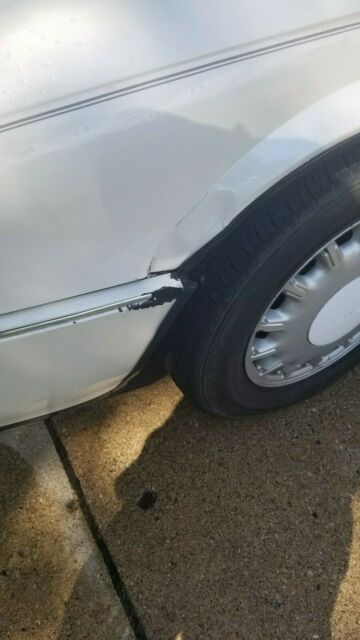 1993 White Cadillac Seville Sedan