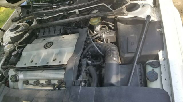 1993 White Cadillac Seville Sedan