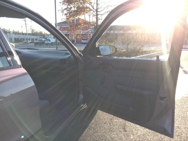 1993 Brown Chevrolet Prizm Sedan