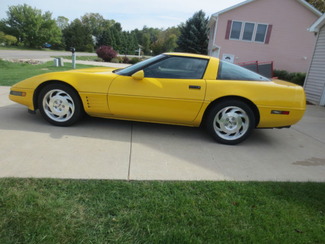 1993 ruby red Chevrolet Corvette Coupe
